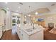 Kitchen island with sink and granite countertop at 11465 Bitola Dr, Odessa, FL 33556