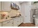 Spacious kitchen with granite countertops and stainless steel appliances at 11465 Bitola Dr, Odessa, FL 33556