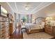 Large main bedroom with hardwood floors and ample natural light at 11465 Bitola Dr, Odessa, FL 33556