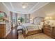 Large main bedroom with hardwood floors and ample natural light at 11465 Bitola Dr, Odessa, FL 33556