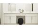 Elegant double vanity bathroom with white cabinets and quartz countertops at 12422 Sweet Angel Aura Way, Parrish, FL 34219