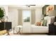 Spacious bedroom with a bed, dresser, and large window at 12422 Sweet Angel Aura Way, Parrish, FL 34219