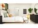 Relaxing bedroom with a comfy bed and stylish decor at 12422 Sweet Angel Aura Way, Parrish, FL 34219