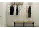 Well-organized closet with shelving and a bench for convenience at 12422 Sweet Angel Aura Way, Parrish, FL 34219