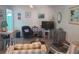 Cozy living room with comfortable seating and stylish decor at 1279 Dinnerbell E Ln, Dunedin, FL 34698