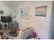 Relaxing living room featuring comfortable seating and coastal decor at 1279 Dinnerbell E Ln, Dunedin, FL 34698