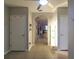 Bright hallway with tile floors and access to other rooms at 15415 Trinity Fall Way, Bradenton, FL 34212