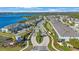 Aerial view of community entrance and waterfront access at 1608 Sunset Wind Loop, Oldsmar, FL 34677