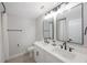 Clean bathroom with double vanity and modern fixtures at 1608 Sunset Wind Loop, Oldsmar, FL 34677