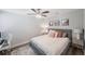 Bright bedroom with a king-size bed, workspace, and modern decor at 1608 Sunset Wind Loop, Oldsmar, FL 34677