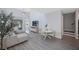 Open concept living area with sectional sofa and dining area at 1608 Sunset Wind Loop, Oldsmar, FL 34677