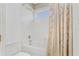 Clean bathroom with a shower/tub combo at 18119 Diamond Cove Ct, Tampa, FL 33647