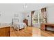 Bedroom with wood floors, window, and ceiling fan at 18119 Diamond Cove Ct, Tampa, FL 33647