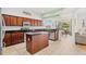 Kitchen features island, granite counters, and stainless steel appliances at 18119 Diamond Cove Ct, Tampa, FL 33647