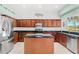 Modern kitchen with stainless steel appliances and granite countertops at 18119 Diamond Cove Ct, Tampa, FL 33647