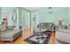 Spacious living room with hardwood floors and couches at 18119 Diamond Cove Ct, Tampa, FL 33647