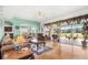 Spacious living room with hardwood floors, and access to the backyard at 18119 Diamond Cove Ct, Tampa, FL 33647