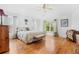 Spacious main bedroom with hardwood floors and large windows at 18119 Diamond Cove Ct, Tampa, FL 33647