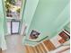 View from above of a mint green staircase at 18119 Diamond Cove Ct, Tampa, FL 33647