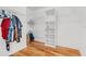 Large walk-in closet with shelving and hanging rods at 18119 Diamond Cove Ct, Tampa, FL 33647