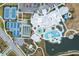 Community center with tennis courts, pools, and a large parking lot at 19771 Ship Wheel Way, Land O Lakes, FL 34638