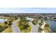 Gated community entrance with curving roads and waterfront views at 19771 Ship Wheel Way, Land O Lakes, FL 34638