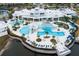 Resort-style pool with multiple areas and a large clubhouse at 19771 Ship Wheel Way, Land O Lakes, FL 34638