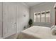 Serene bedroom with neutral tones, plush bedding, and a tranquil atmosphere at 19771 Ship Wheel Way, Land O Lakes, FL 34638