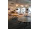 Large event space with plenty of tables and chairs at 19771 Ship Wheel Way, Land O Lakes, FL 34638