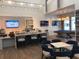 Community clubhouse with a bar, pool table, and seating area at 19771 Ship Wheel Way, Land O Lakes, FL 34638