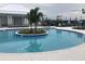Relaxing community pool with a surrounding patio at 19771 Ship Wheel Way, Land O Lakes, FL 34638