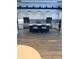 Modern kitchen with white cabinets and a large island at 19771 Ship Wheel Way, Land O Lakes, FL 34638