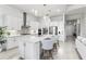Open concept kitchen with island and stainless steel appliances at 19771 Ship Wheel Way, Land O Lakes, FL 34638