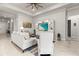 Spacious living room with comfortable seating and large TV at 19771 Ship Wheel Way, Land O Lakes, FL 34638