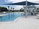 Inviting pool with a shaded seating area and gazebo at 19771 Ship Wheel Way, Land O Lakes, FL 34638
