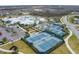 Community tennis courts with surrounding landscape at 19771 Ship Wheel Way, Land O Lakes, FL 34638