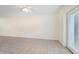 Living room with tile floors and sliding glass doors at 2007 S Carolina Ave, Tampa, FL 33629