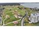 Aerial view of golf course and condo building at 220 Belleview Blvd # 607, Belleair, FL 33756