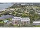 Aerial view of the building, pool, and surrounding area at 220 Belleview Blvd # 607, Belleair, FL 33756