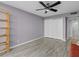 Spacious bedroom with light gray walls and hardwood floors at 220 Belleview Blvd # 607, Belleair, FL 33756