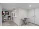 Bright entryway with modern flooring and a view into the kitchen at 220 Belleview Blvd # 607, Belleair, FL 33756