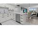Modern white kitchen with stainless steel appliances at 220 Belleview Blvd # 607, Belleair, FL 33756