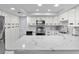 Modern kitchen with white cabinets, quartz countertops, and stainless steel appliances at 220 Belleview Blvd # 607, Belleair, FL 33756