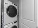 Stackable Samsung washer and dryer in a closet at 220 Belleview Blvd # 607, Belleair, FL 33756