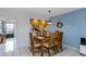 Condo dining room with wood table and chairs, near kitchen at 225 Nina Way # 225, Oldsmar, FL 34677