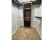Large walk-in closet with built-in shelving at 24932 Ravello St, Land O Lakes, FL 34639