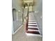 Elegant entryway with tile flooring and staircase at 24932 Ravello St, Land O Lakes, FL 34639