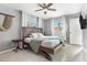 Bright bedroom with a wooden bed frame and plenty of natural light at 271 49Th N St, St Petersburg, FL 33710