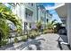 Private backyard with paved patio and black metal fence at 2819 1St S Ave, St Petersburg, FL 33712
