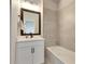 Clean bathroom with a single vanity and bathtub at 2819 1St S Ave, St Petersburg, FL 33712